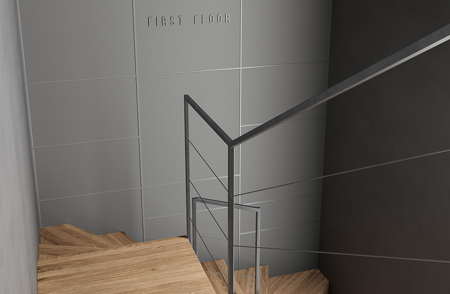 A stairwell with walls covered by FENIX X-KIN