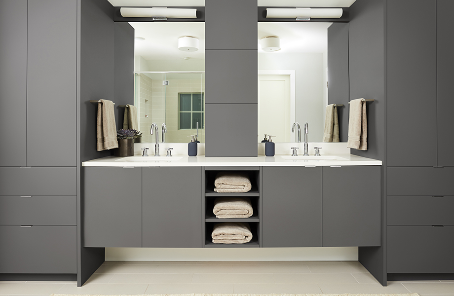 Modern bathroom with double sinks and Grigio Bromo gray matte flat-front cabinetry