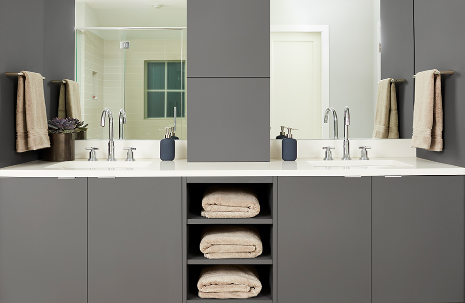 decorative mirrors in a bathroom with double sinks
