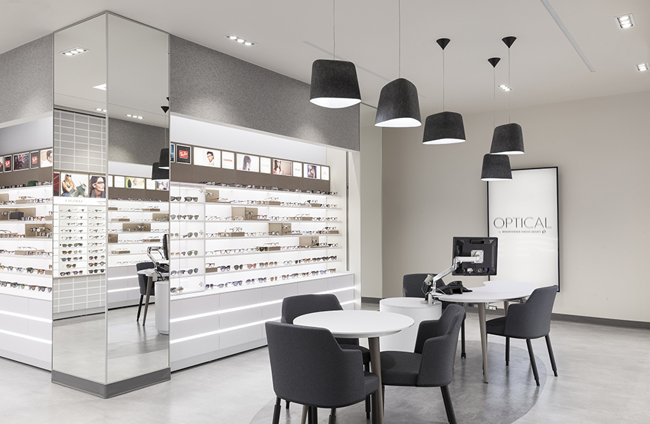 Tux Optical glasses shop with display, lights and table and chairs, a FENIX case study
