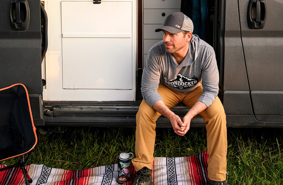 Man sitting in camper van