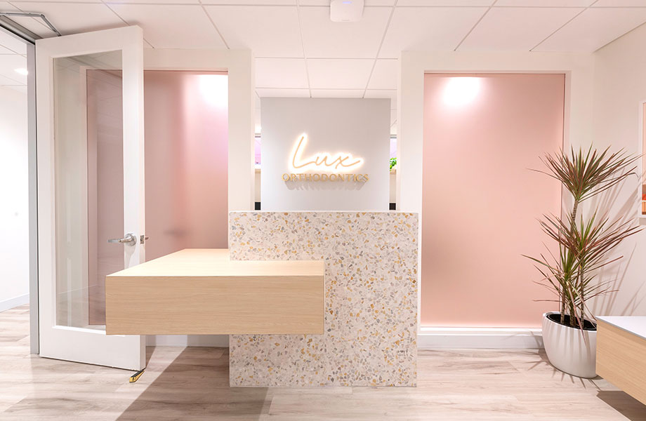 Dental reception area with FENIX and Formica surfaces
