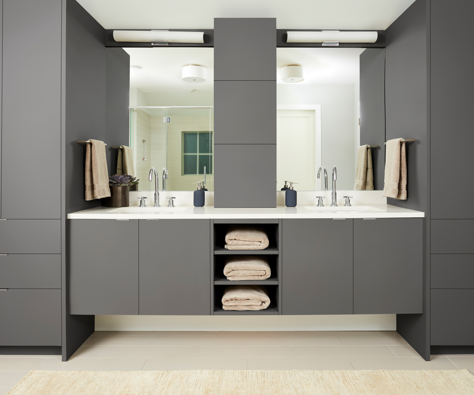 This high-end FENIX NTM Grigio Londra cabinetry creates a clean and modern vibe in any bathroom